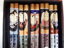 Sumo image chopsticks in box.
